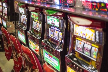 Play'n GO slot game interface showing reels and bonus features on qrisbos